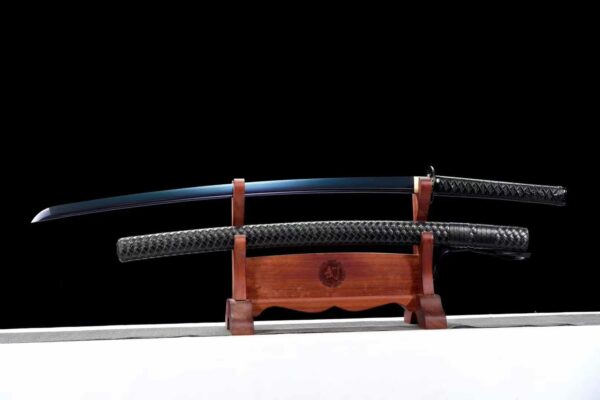 A carbon steel samurai sword with a blued finish.